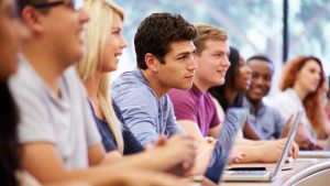 Class Of University Students Using Laptops In Lecture